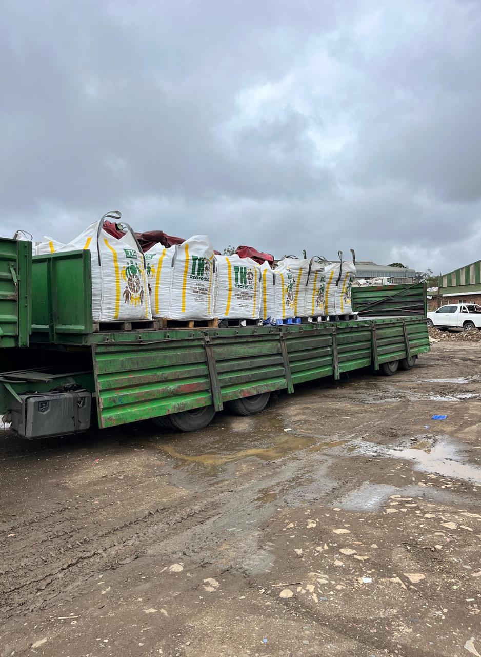 Amabongo Solutions truck transporting bulk bags of processed glass cullet in Pietermaritzburg.